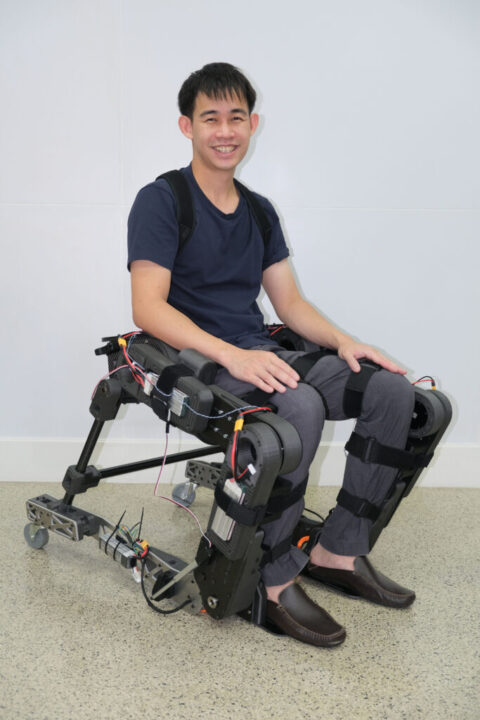 Assoc. Prof. Dr. Ronnapee Chaichaowarat 
Trying on the Exoskeleton wheelchair 